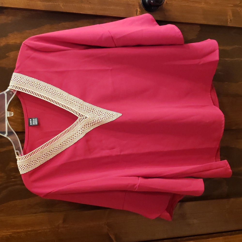 Large red flounce sleeve blouse